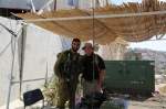 Civilian with IDF soldier under hut