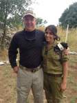 Civilian with arm around female IDf soldier