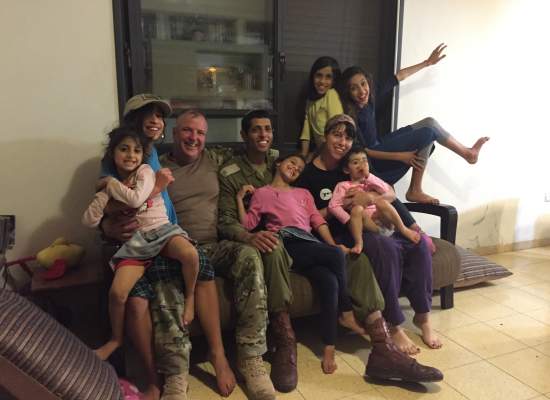 IDF soliders with children